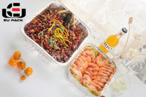 Black plastic food container with microwave-safe design and transparent lid for tight sealing. Ideal for meal prep, takeout meals, and daily food storage.